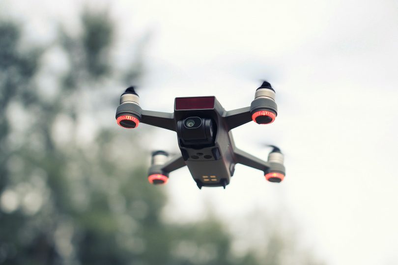 Photo by Pok Rie: https://www.pexels.com/photo/black-and-red-quadcopter-drone-529598/
