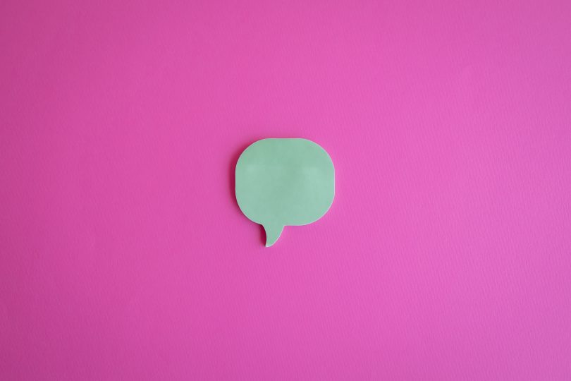 Photo by Jorge Urosa: https://www.pexels.com/photo/a-cutout-of-a-dialogue-box-on-a-pink-surface-9131059/